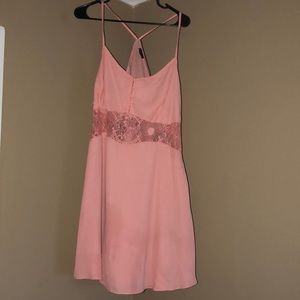 Mini pink/peach dress with lace/see through region